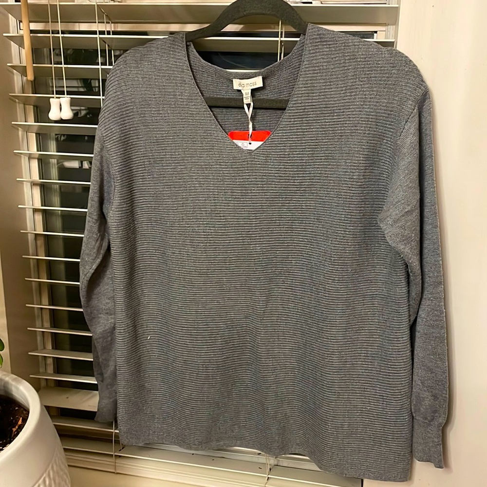 Snuggle into this Soft Grey Knit Sweater
